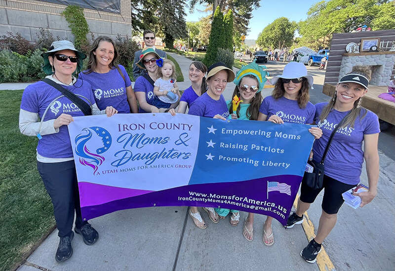 Shelley Schnieder gathered her mothers and daughters group to hand